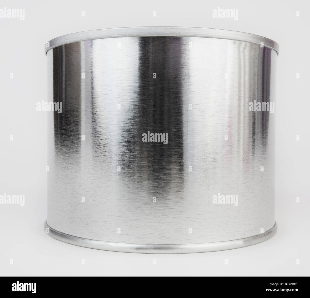 Short and squat shiny closed food container. White background. Stock Photo