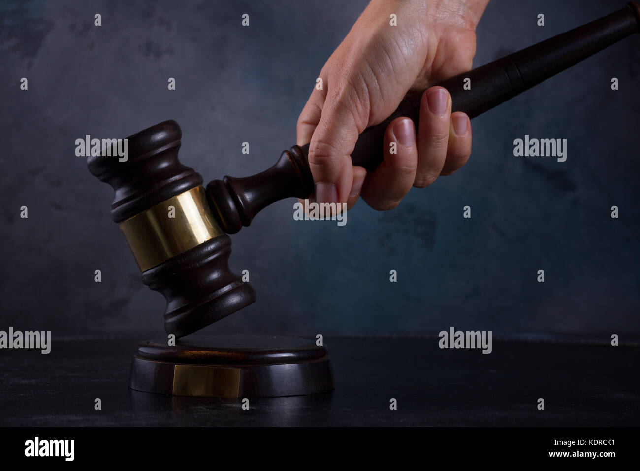 Hand holding law gavel Stock Photo Alamy