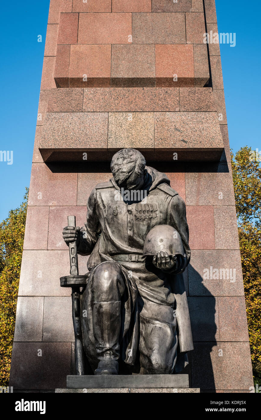 Berlin, Germany - october 2017: Statue of a russian soldier at the  Soviet War Memorial and military cemetery in Berlin's Treptower Park Stock Photo