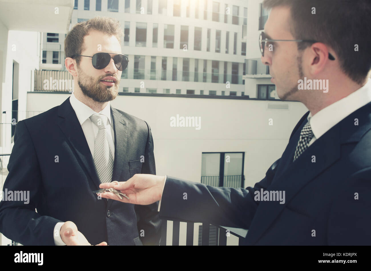 Young businessman investor buying new apartment. estate real agent