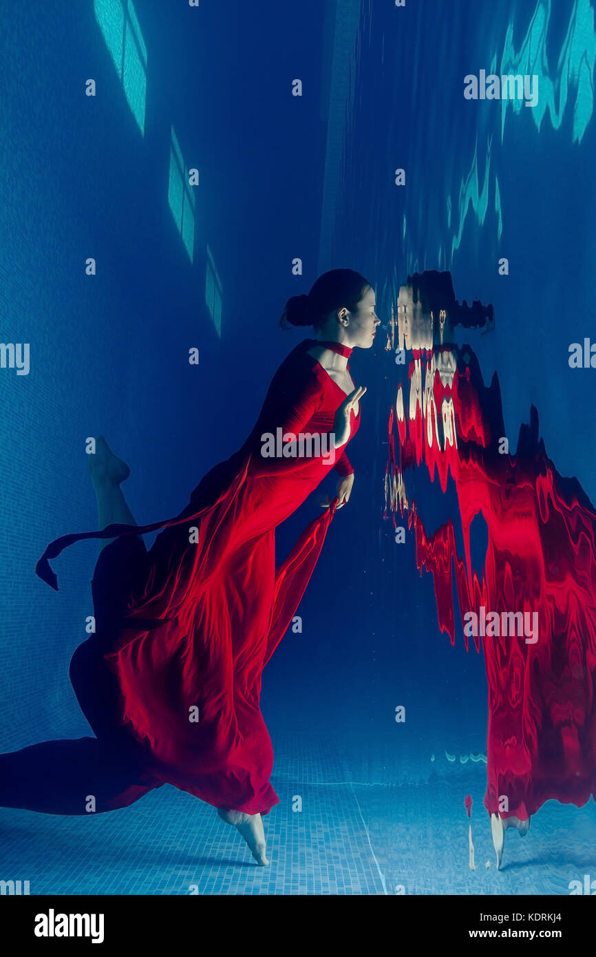 Red dress underwater Stock Photo Alamy