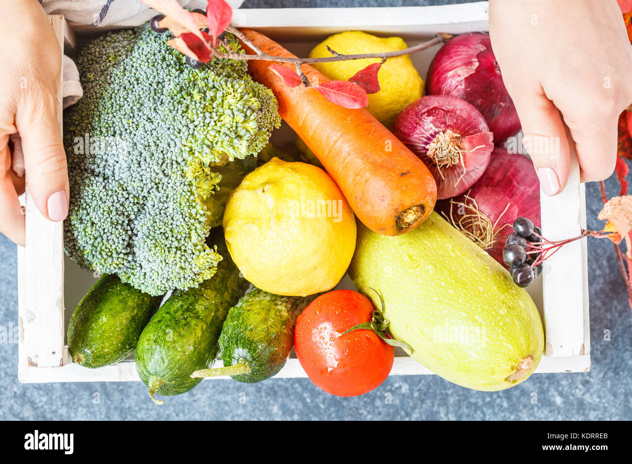autumn vegetables with white wooden box, harvest vegan meal concept. Stock Photo