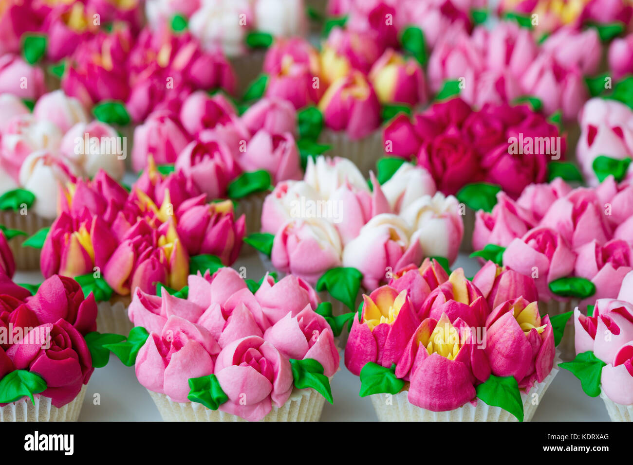 Cupcakes frosted using Russian piping tips Stock Photo