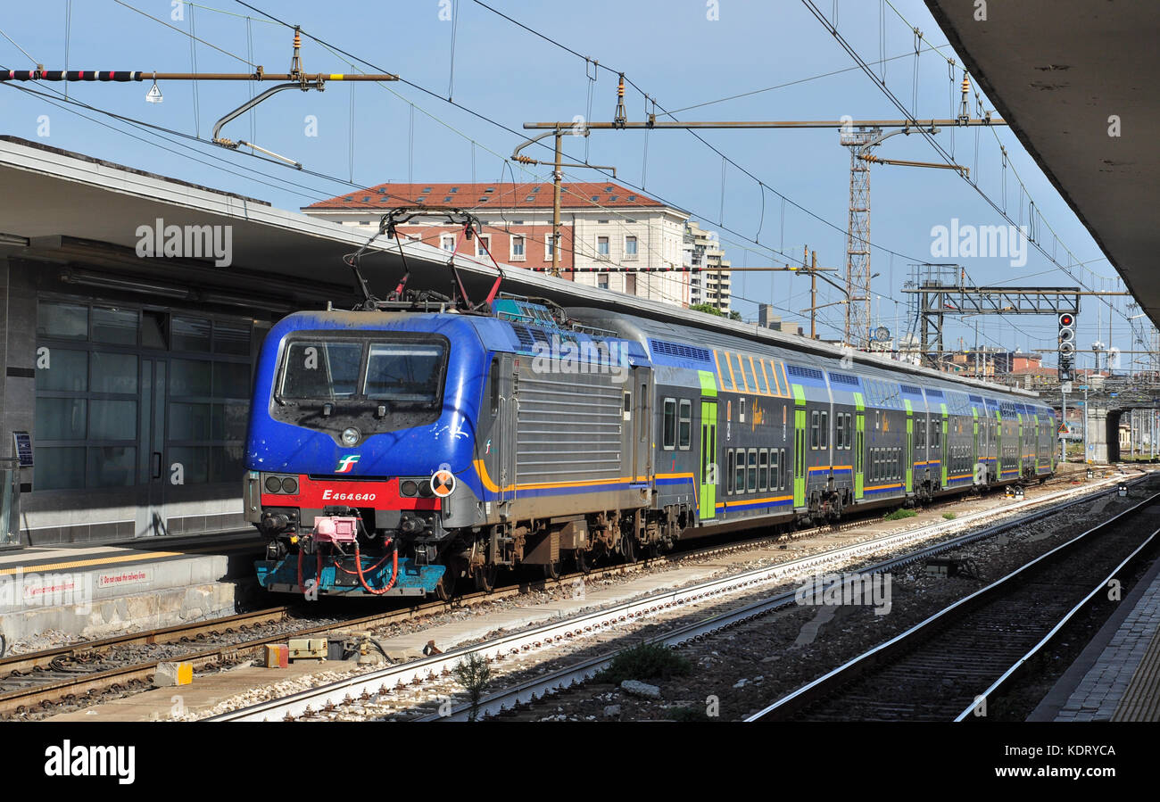 Class E464 electric locomotive at the head of a passenger train, Central Railway Station, Bologna, Italy Stock Photo