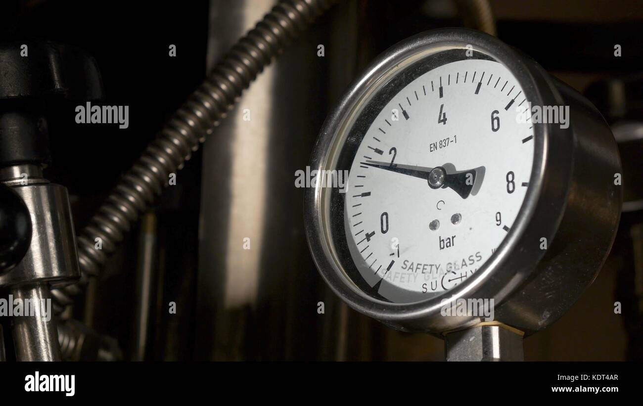 Gauge pressure in the pipeline. Pressure gauge, manometer closeup Stock Photo