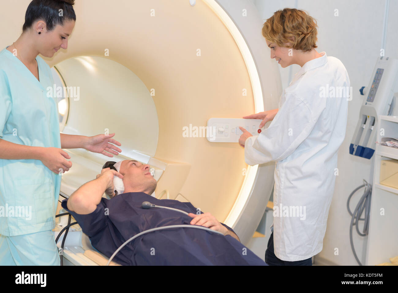 nurse and technican with patient for mri Stock Photo