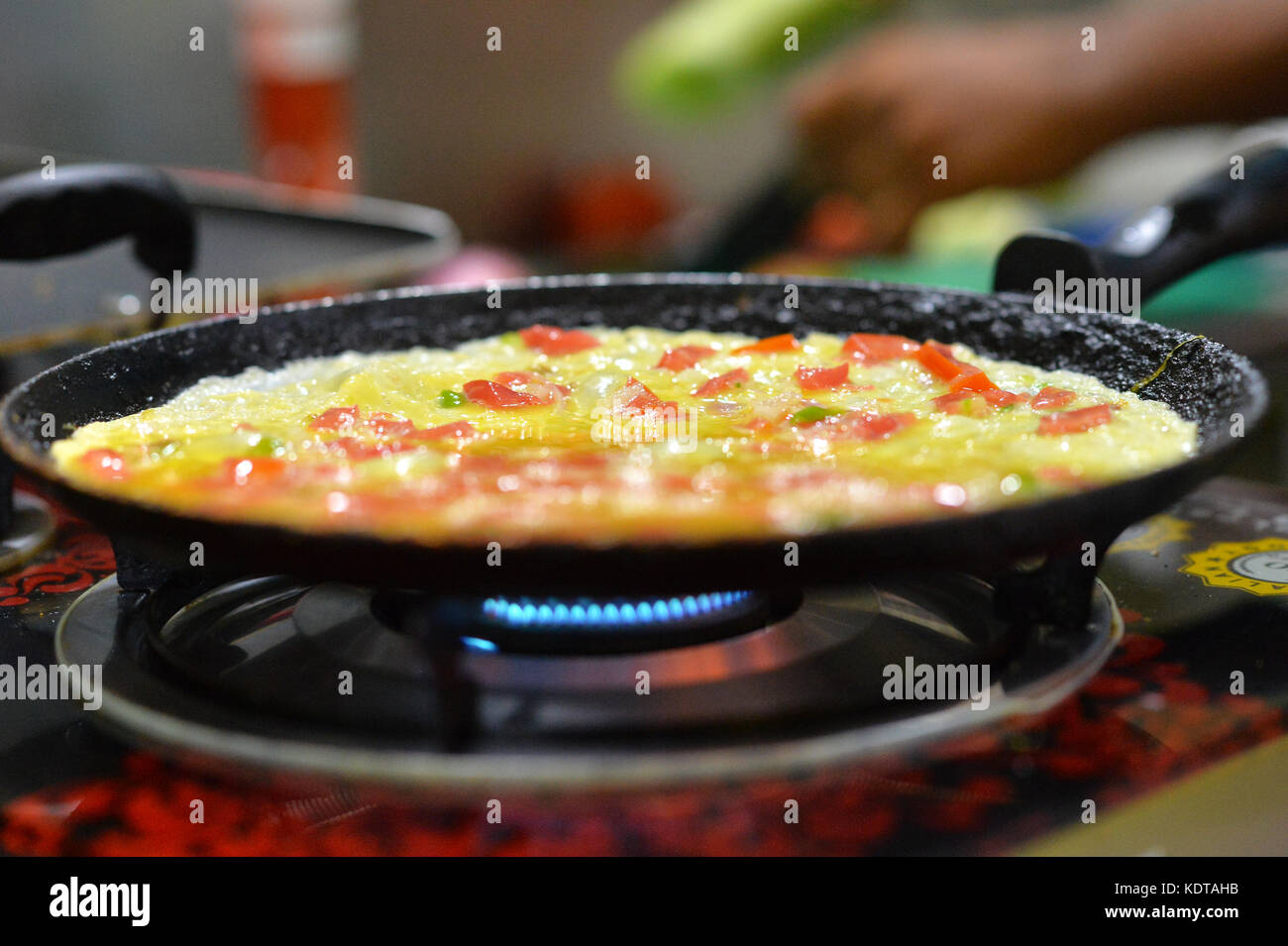 preparing meal on stove Stock Photo Alamy