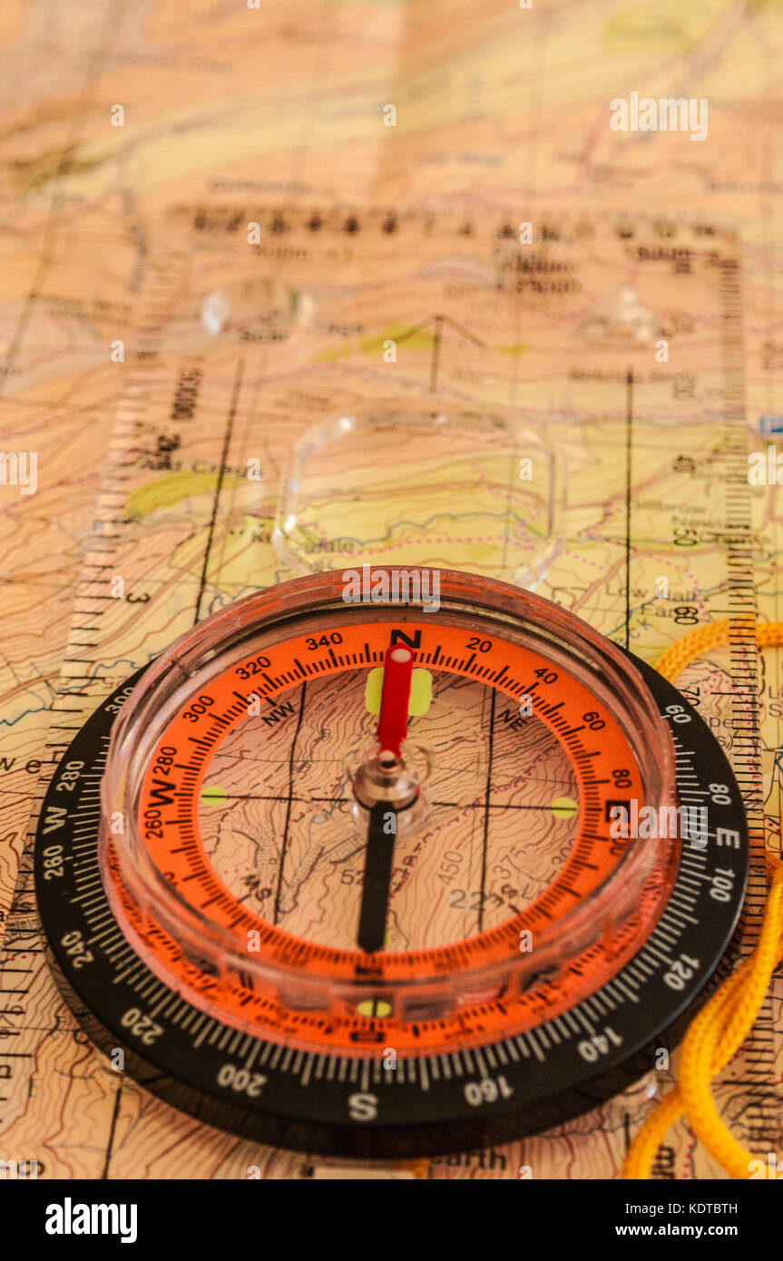 Compass showing direction on Topographic Map, Shallow Depth of Field