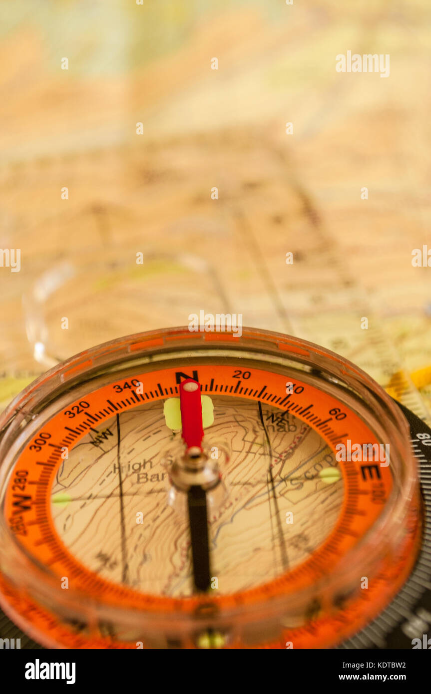 Compass showing direction on Topographic Map, Shallow Depth of Field