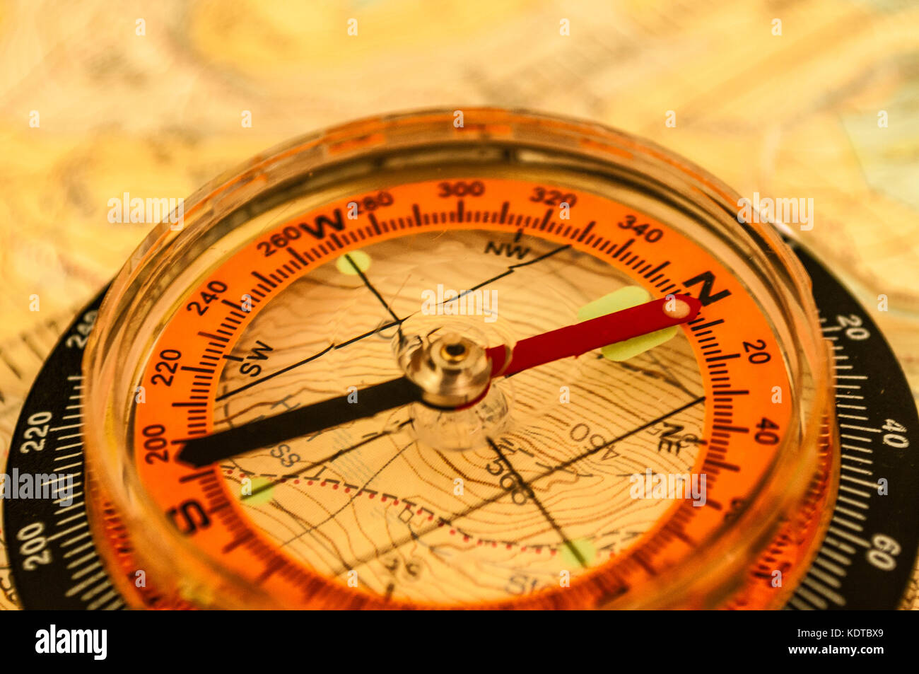 Compass showing direction on Topographic Map, Shallow Depth of Field