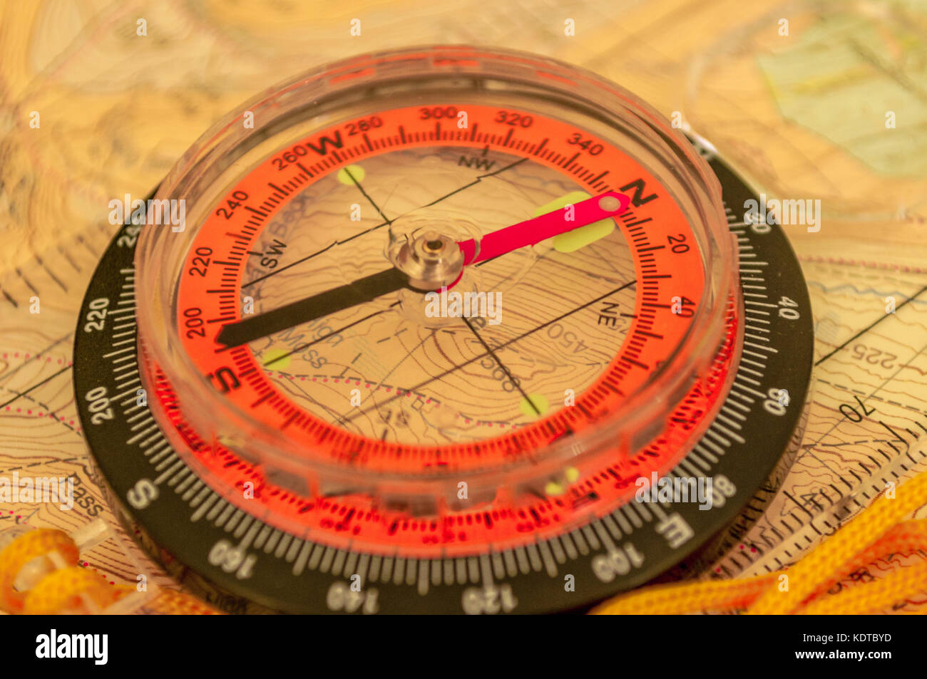 Compass showing direction on Topographic Map, Shallow Depth of Field, focus on North Stock Photo