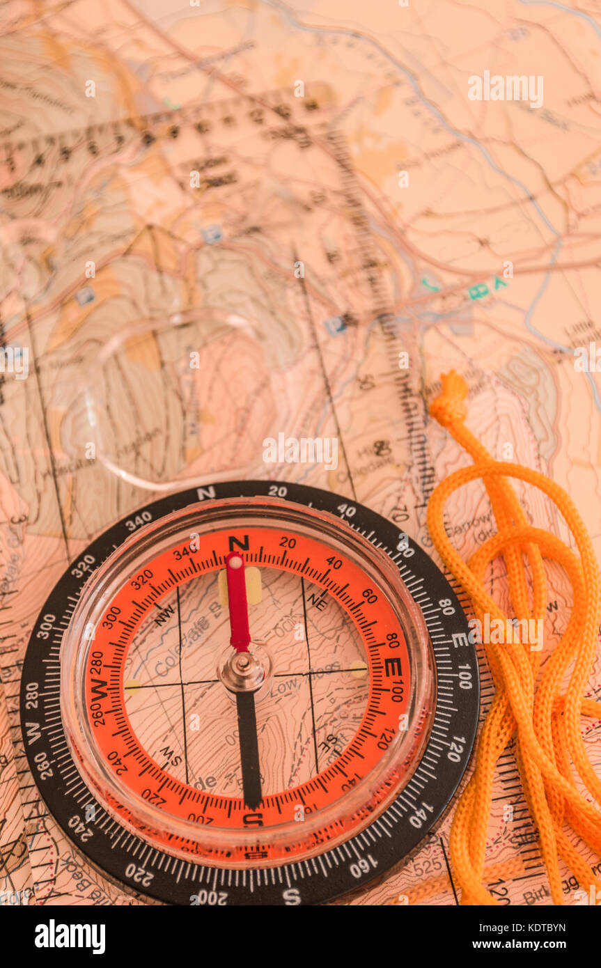 Compass showing direction on Topographic Map, Shallow Depth of Field, focus on North Stock Photo