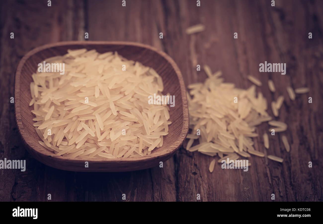 Basmati rice uncooked on natural surface Stock Photo Alamy