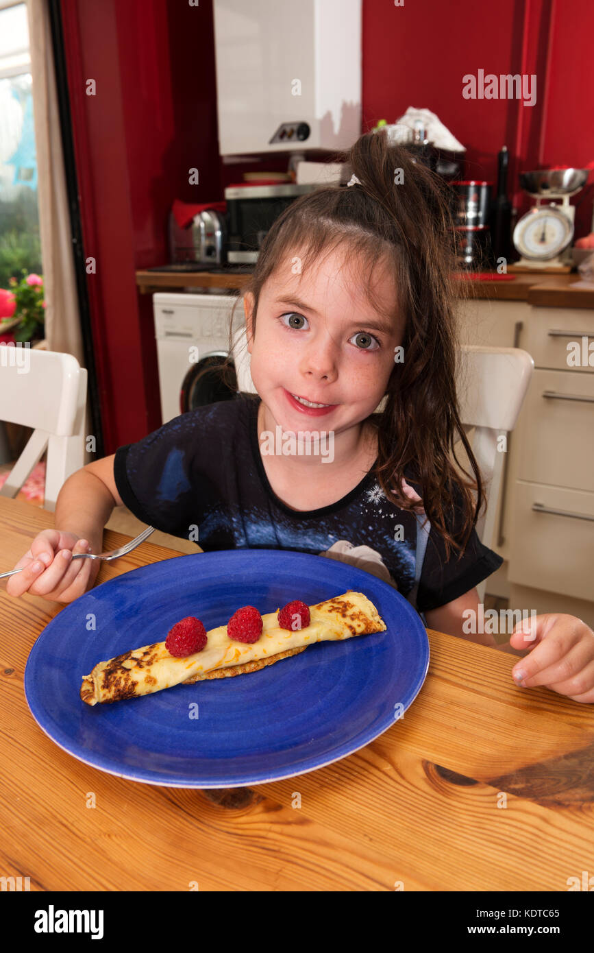5 Year Old Girl Eating A Pancake For Breakfast Hi res Stock Photography 5 Year Old Girl Eating A Pancake For Breakfast Hi res Stock Photography
