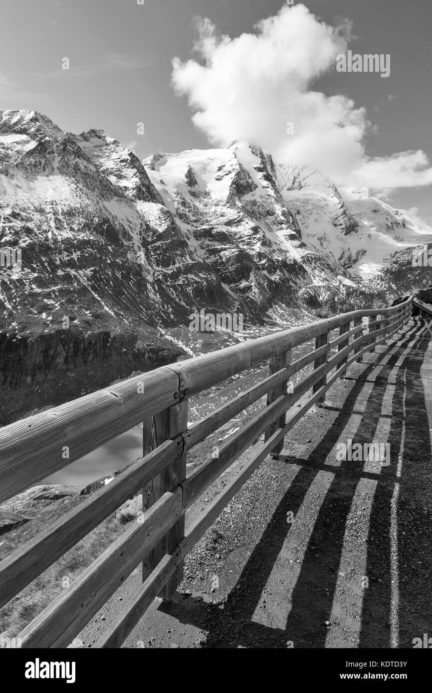 Grossglockner High Alpine Road in Austrian Alps. Mountains landscape on Kaiser Franz Josef glacier. Black and white. Stock Photo