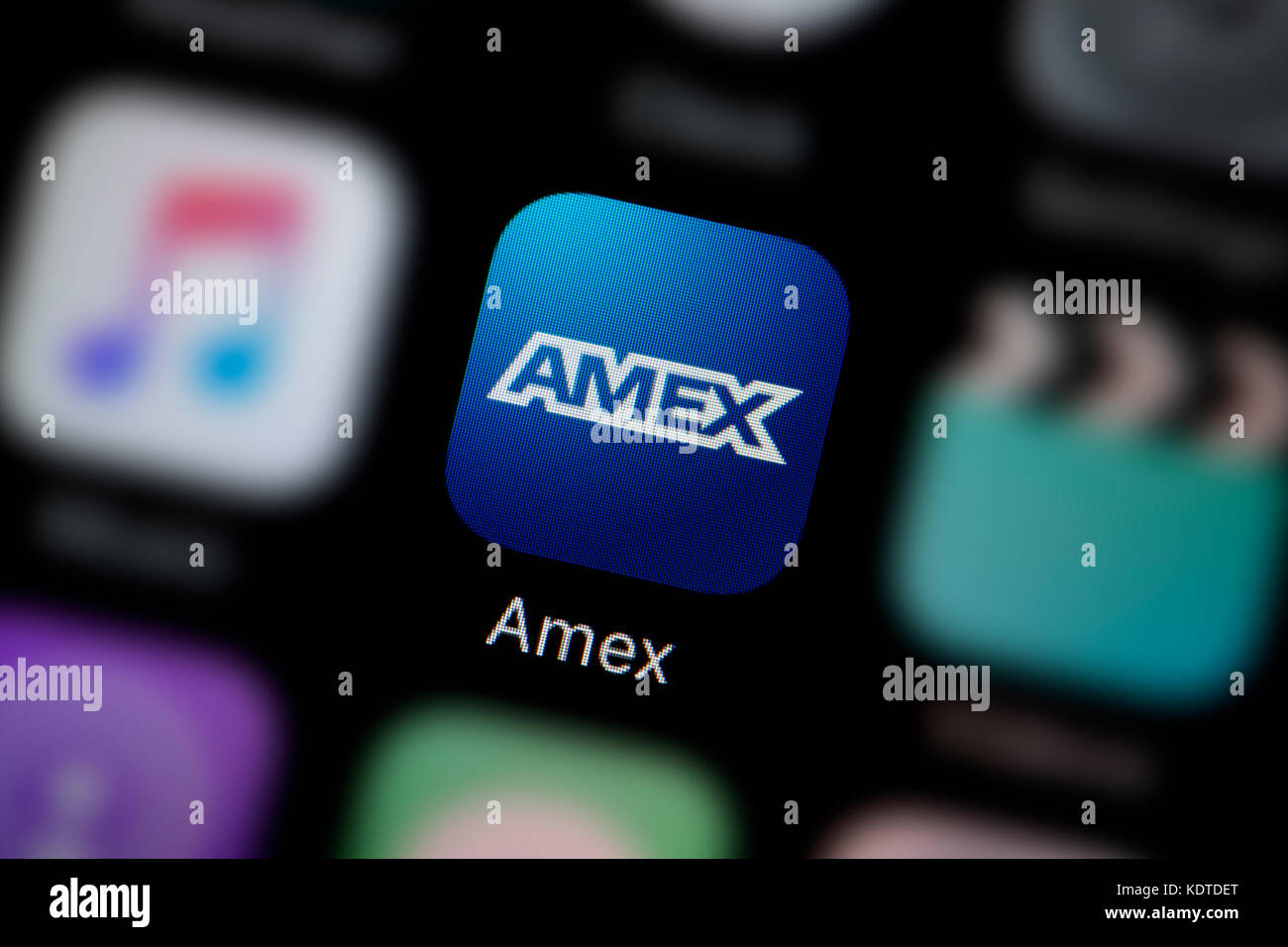A close-up shot of the logo representing the Amex app icon, as seen on the screen of a smart phone (Editorial use only) Stock Photo