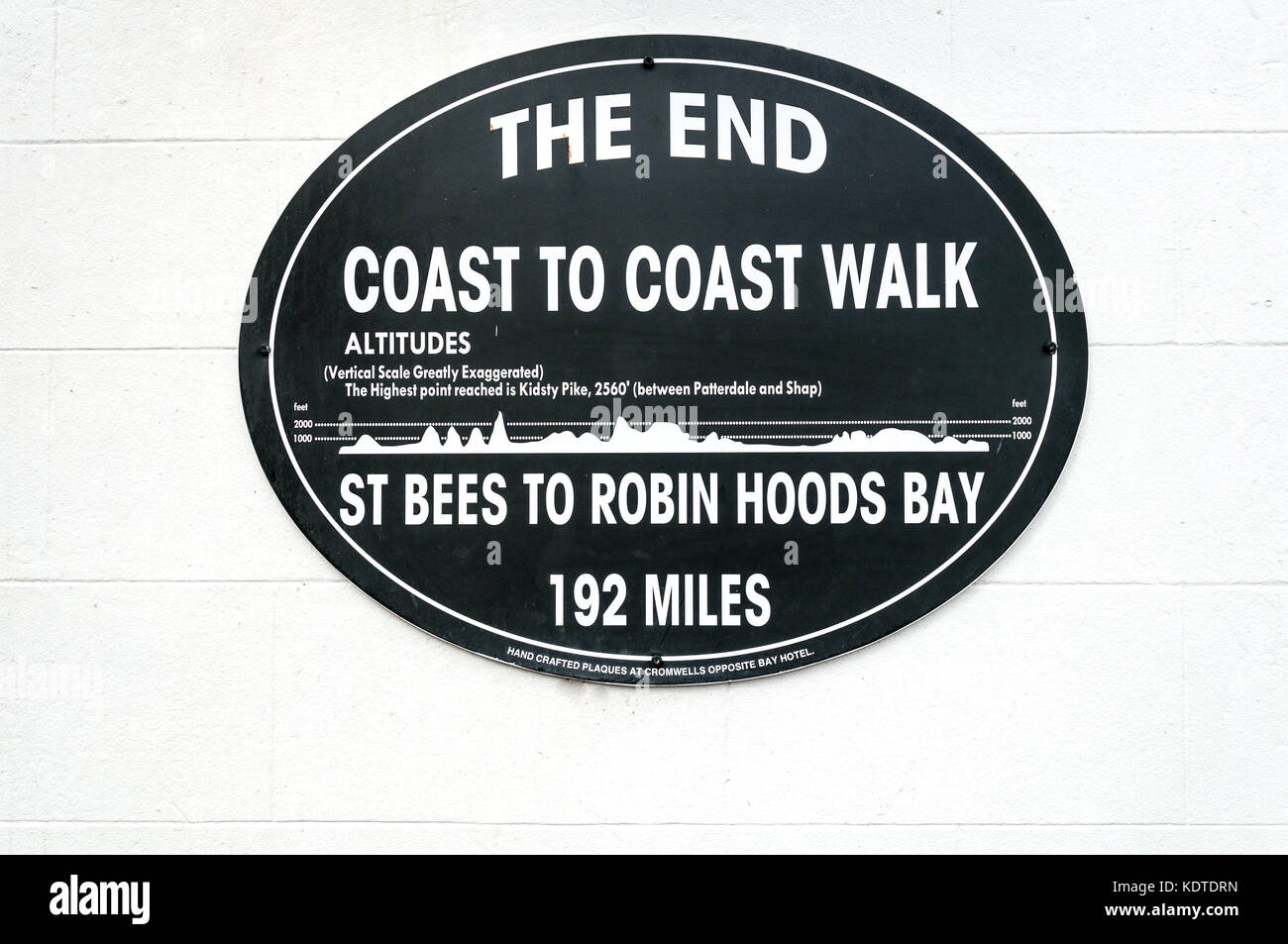 Robin Hoods Bay, England - July 11, 2016: Plaque marking the end point of Wainwrights coast to coast long distance walk Stock Photo