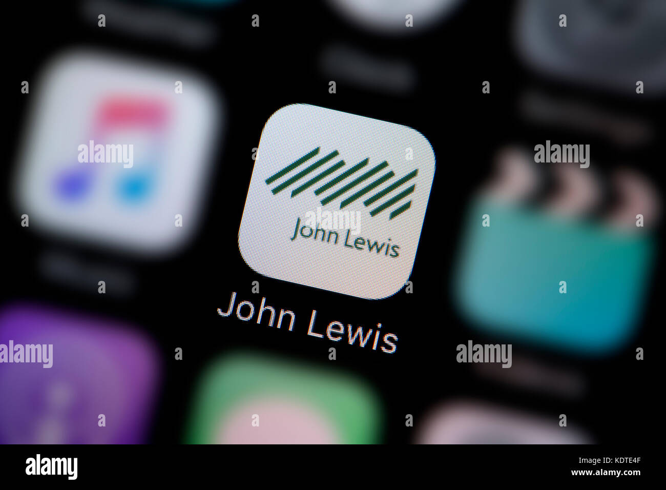 A close-up shot of the logo representing the John Lewis app icon, as seen on the screen of a smart phone (Editorial use only) Stock Photo