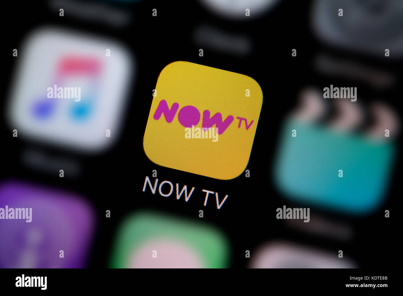 A close-up shot of the logo representing the NOW TV app icon, as seen on the screen of a smart phone (Editorial use only) Stock Photo