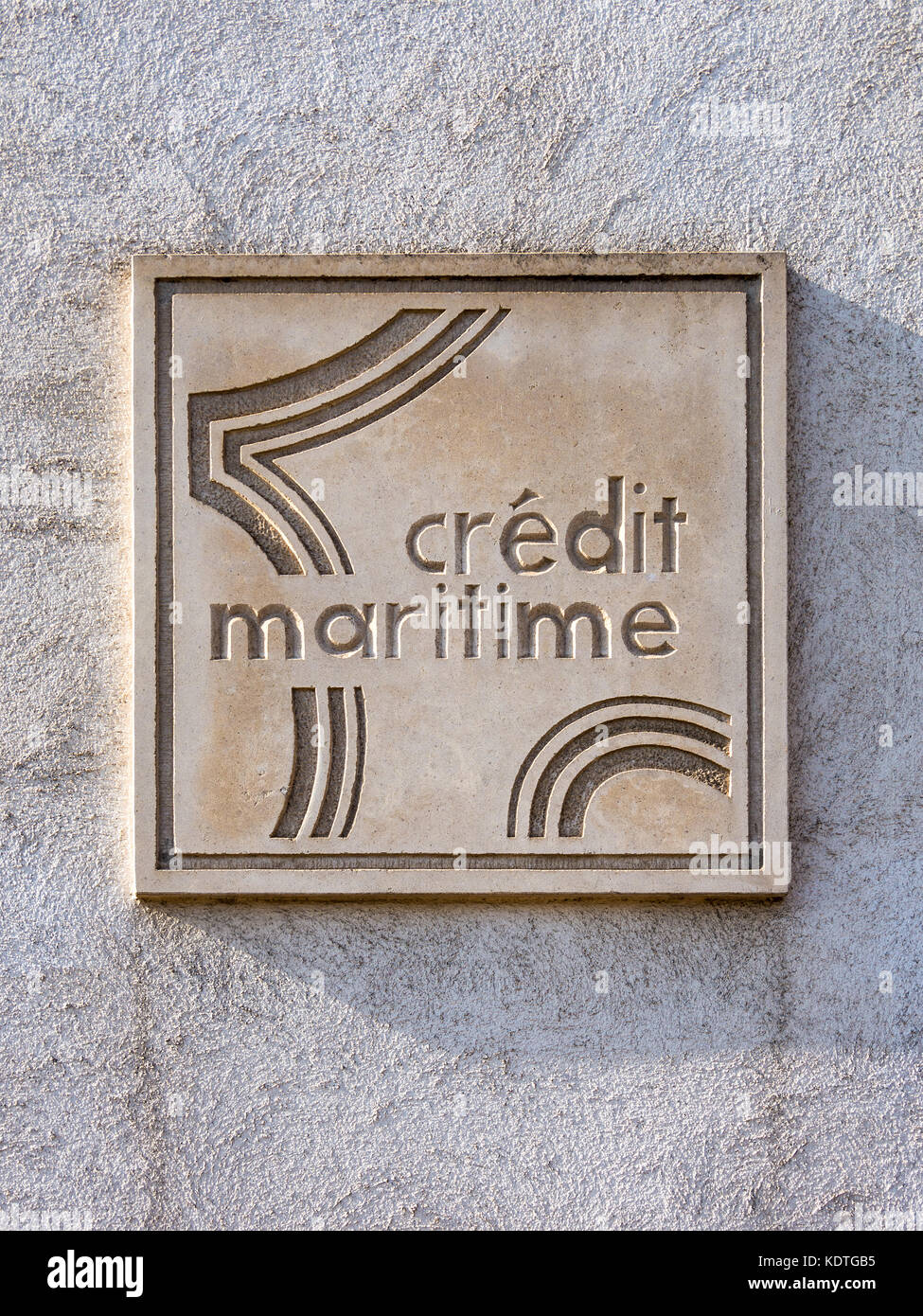 Credit Maritime stone plaque, La Rochelle, France. Stock Photo