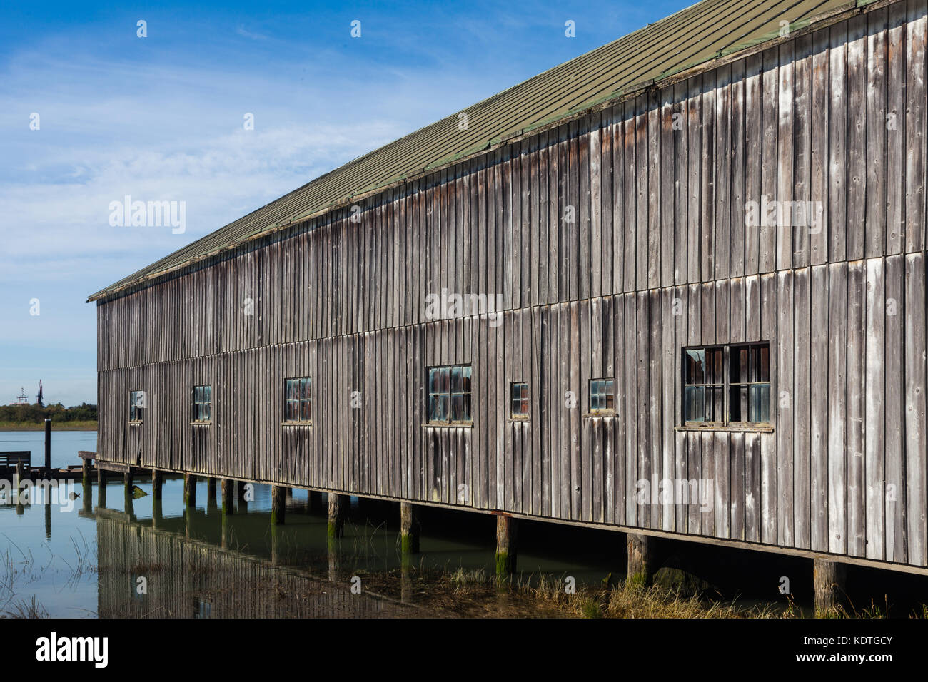 Historic building over the water, once part of the BC Packers Salmon cannery in Steveston, British Columbia Stock Photo