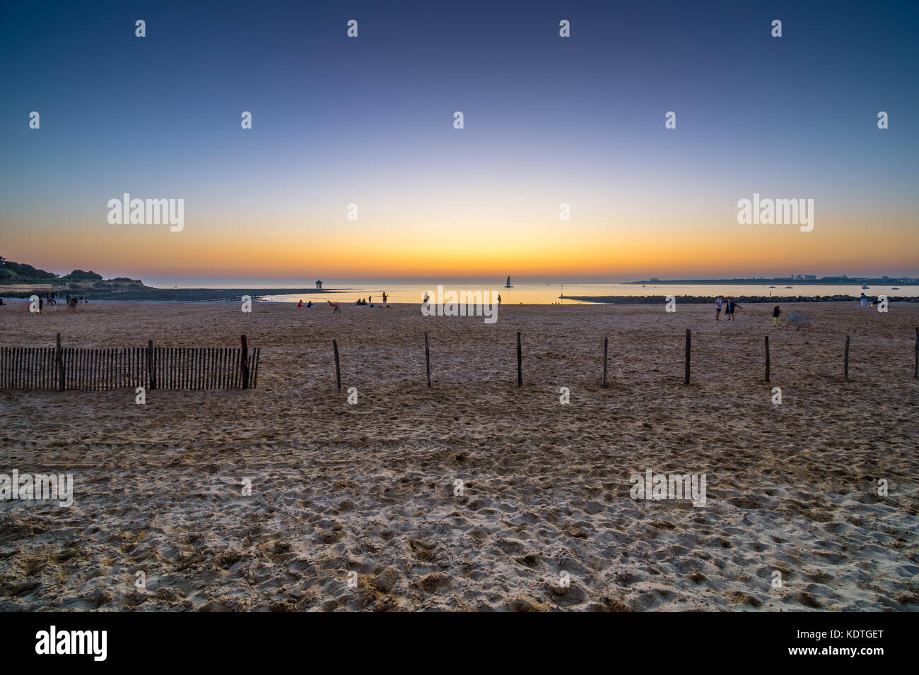 Sunset across the beach, Les Miinnimes, La Rochelle, France. Stock Photo