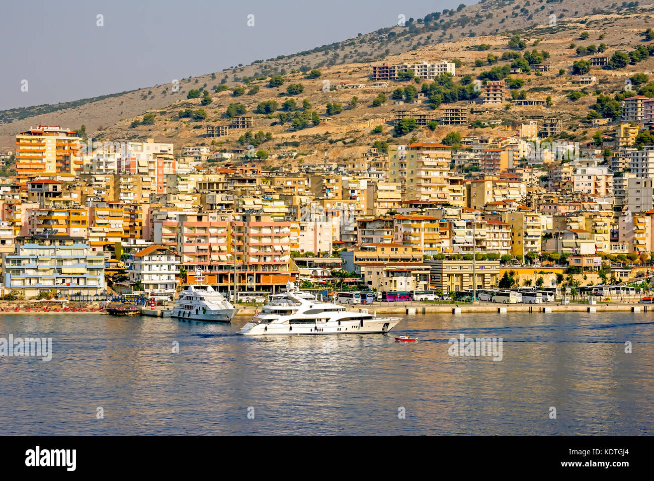 Saranda Bay yacht and city skyline, Albania capital of Albanian Riviera, Sarande, Vlore County, Albania. Stock Photo