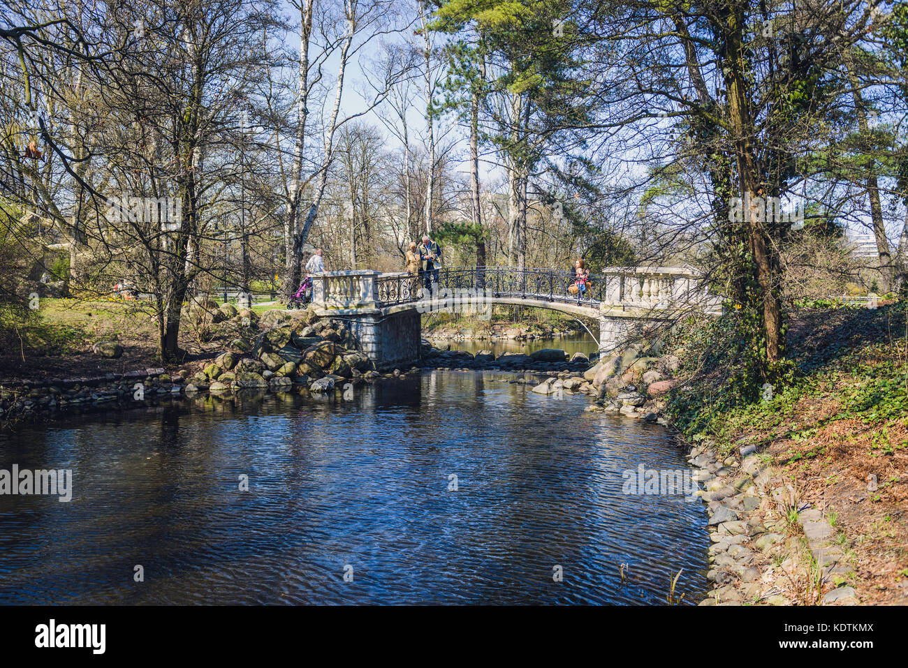 Small bridge in Ujazdow Park (Park Ujazdowski) in Warsaw, Poland Stock Photo