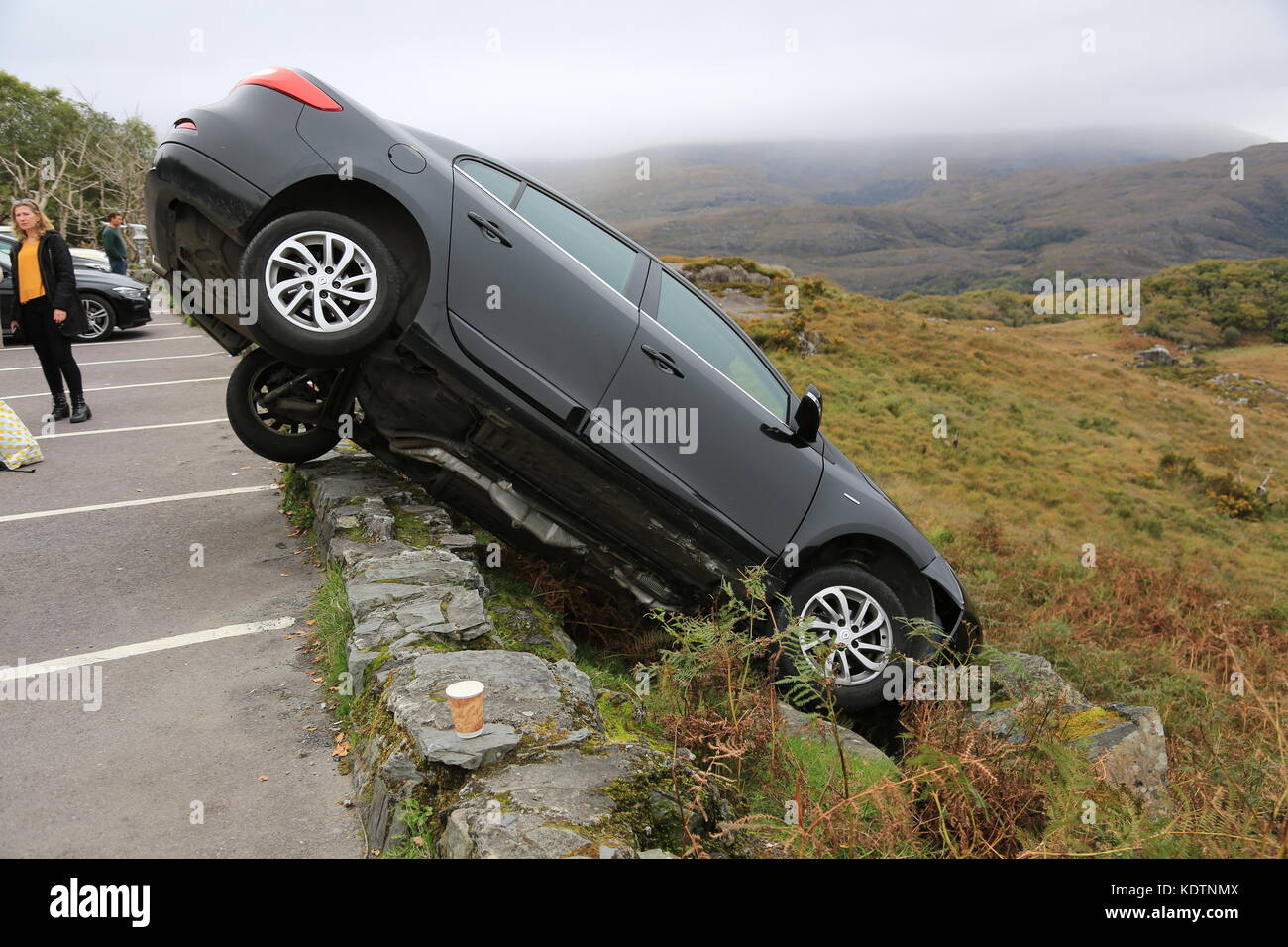 Car falling off the side of a mountain road in Ireland Stock Photo Alamy