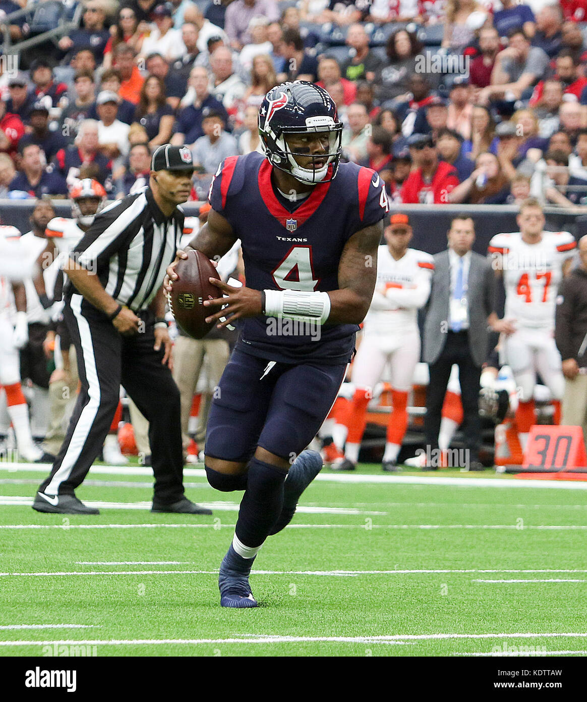 Cleveland, United States. 17th Dec, 2022. Cleveland Brown's quarterback  Deshaun Watson (4) throws a pass under pressure from Baltimore Ravens  Justin Madubuike (92) in the first half in Cleveland, Ohio December 17