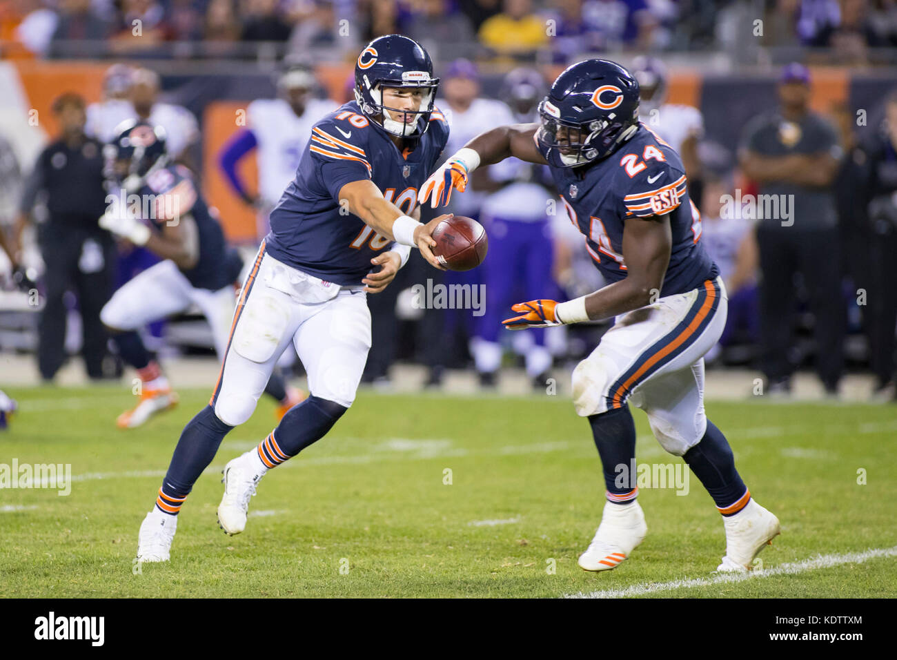 Chicago, Illinois, USA. 09th Oct, 2017. - Bears Quarterback #10 Mitchell Trubisky hands off the ball to #24 Jordan Howard during the NFL Game between the Minnesota Vikings and Chicago Bears at Soldier Field in Chicago, IL. Photographer: Mike Wulf Credit: csm/Alamy Live News Stock Photo