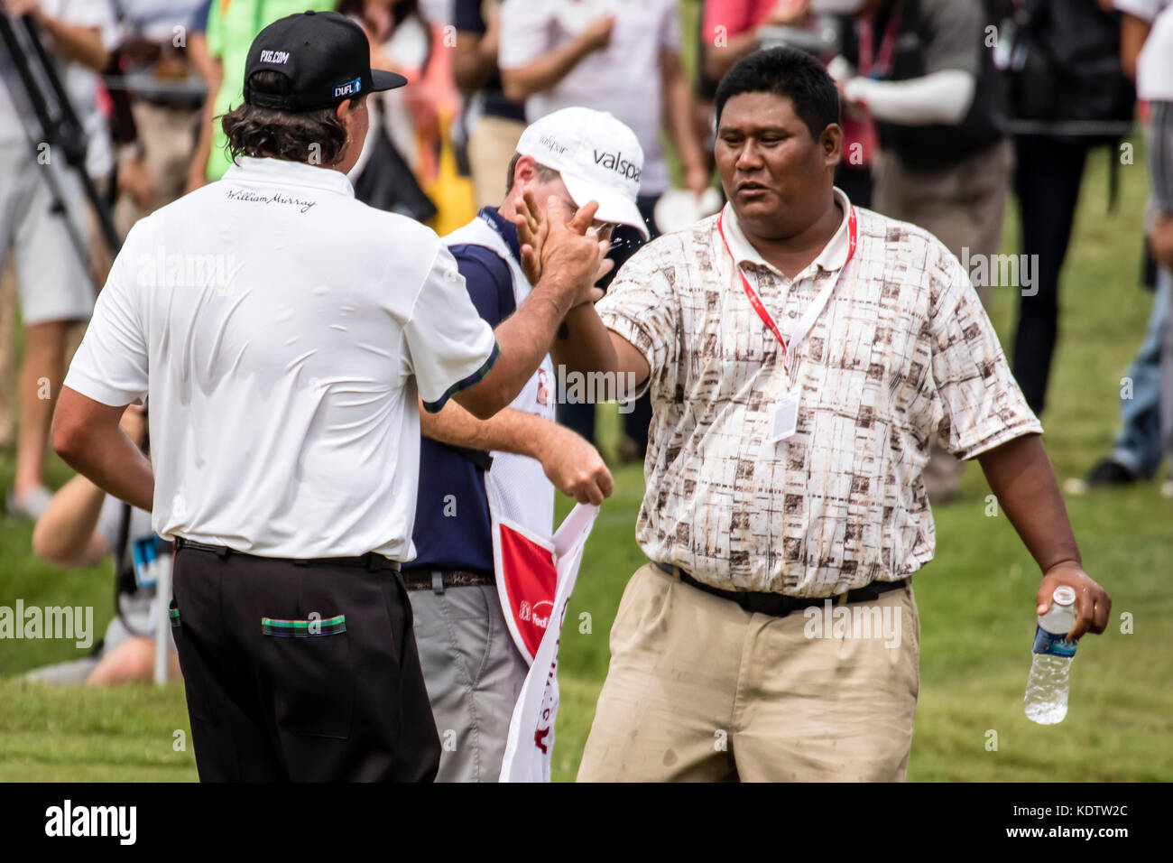 Kuala Lumpur, Malaysia. 15th October, 2017. USA Pat Perez wins the PGA CIMB Classic 2017 in Kuala Lumpur, Malaysia. Perez and his caddy was surprised with cold water dump on them at the 18th green for Perez PGA Tour winning. © Danny Chan/Alamy Live News. Stock Photo