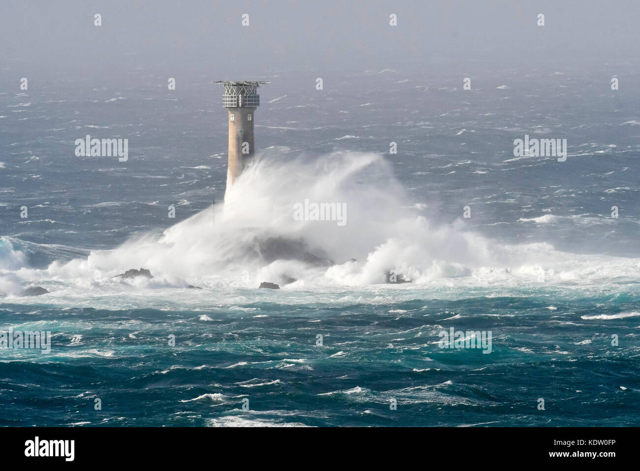 Lands End, Cornwall, UK. 16th Oct, 2017. UK Weather. Gale force winds from ex hurricane Ophelia whips up huge stormy seas which spectacularly crash against the Longships Lighthouse off the coast of Lands End in Cornwall. Photo Credit: Graham Hunt/Alamy Live News Stock Photo