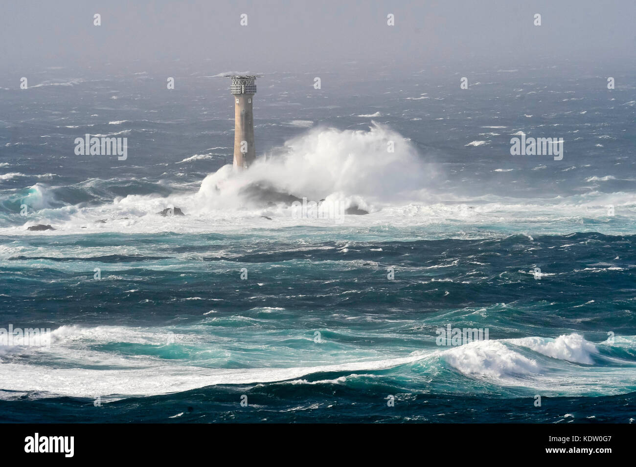 Lands End, Cornwall, UK. 16th Oct, 2017. UK Weather. Gale force winds from ex hurricane Ophelia whips up huge stormy seas which spectacularly crash against the Longships Lighthouse off the coast of Lands End in Cornwall. Photo Credit: Graham Hunt/Alamy Live News Stock Photo