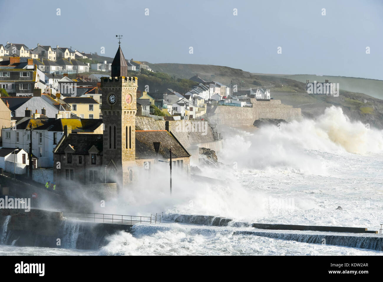 Porthleven, Cornwall, UK. 16th October 2017.  UK Weather.   Huge waves whipped up by ex hurricane Ophelia smash into the coastal sea defences at the seaside town of Porthleven in Cornwall.  Photo Credit: Graham Hunt/Alamy Live News Stock Photo