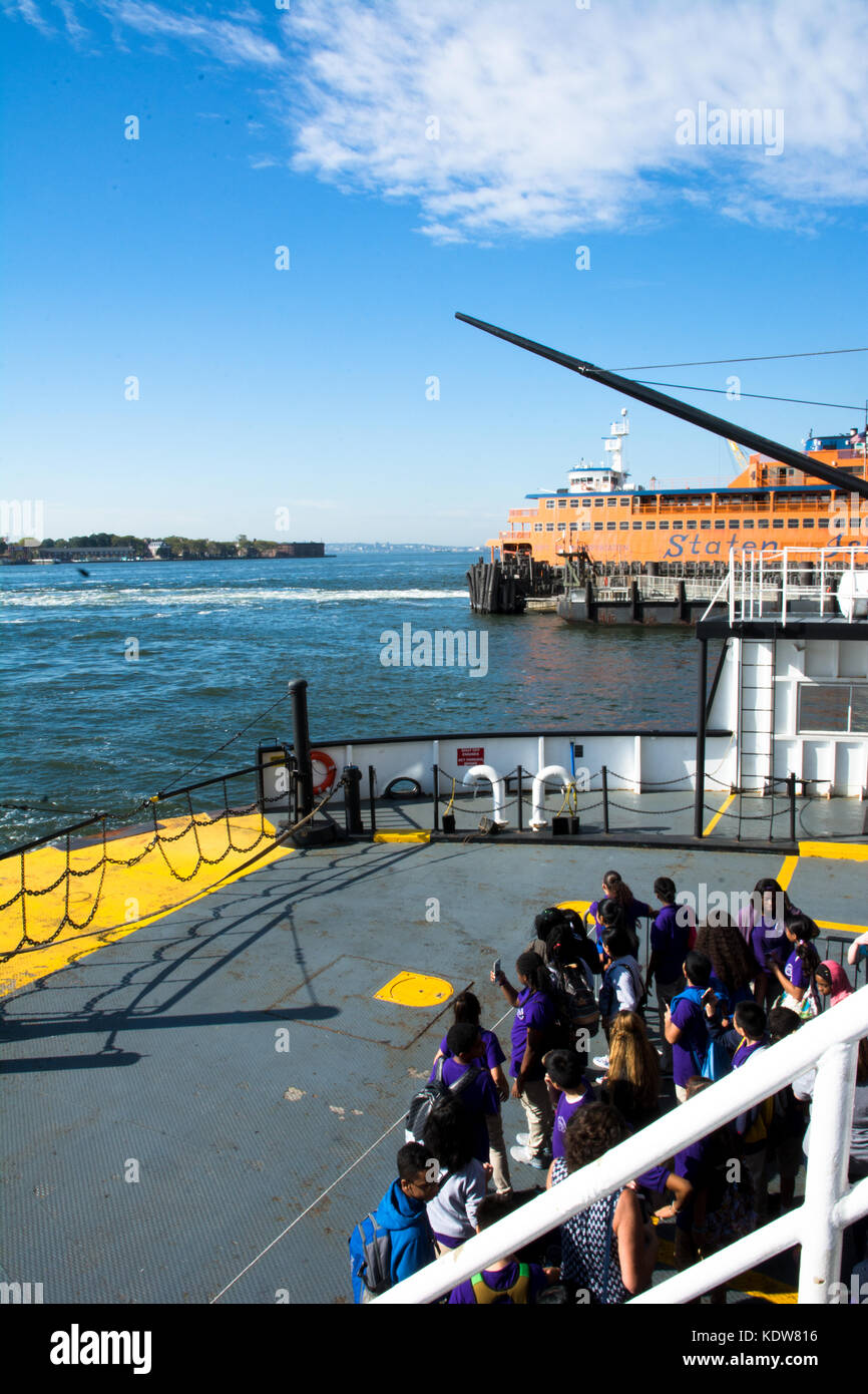 Tourists and visitors arrive at Governors Island from the Governors