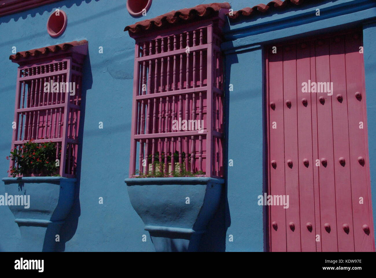 The blue house with a pink door and windows, Cartagena, olombia Stock Photo