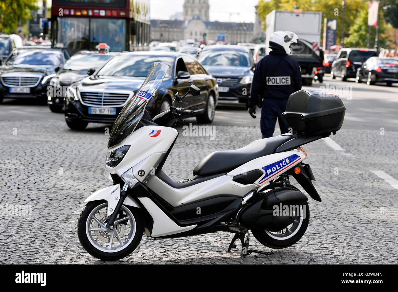 Police officer regulating traffic, Paris - France Stock Photo