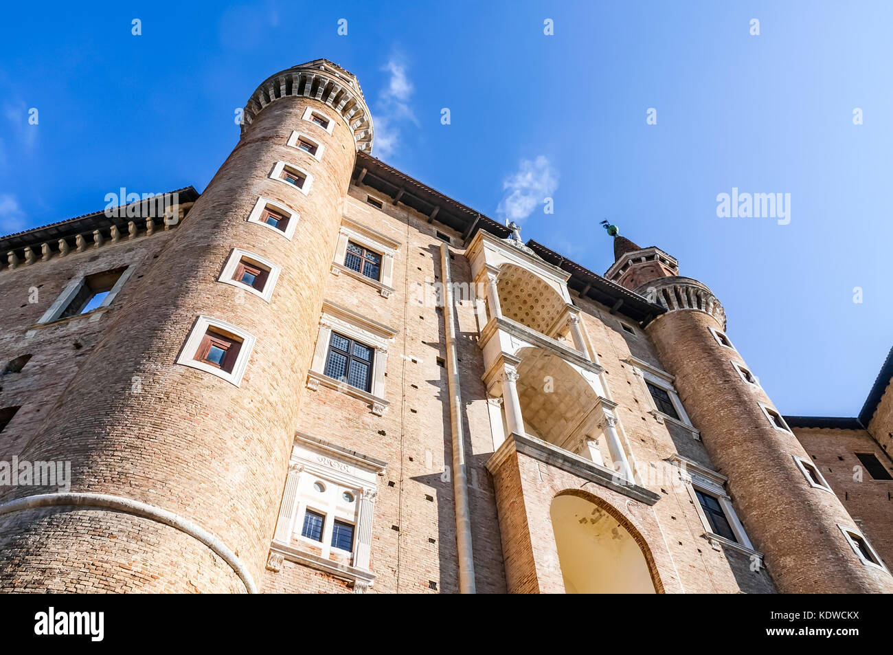 The renaissance town of Urbino, Marche, Italy. A view from down of the Ducale Palace (Palazzo Ducale) in Urbino city, Marche, Italy Stock Photo