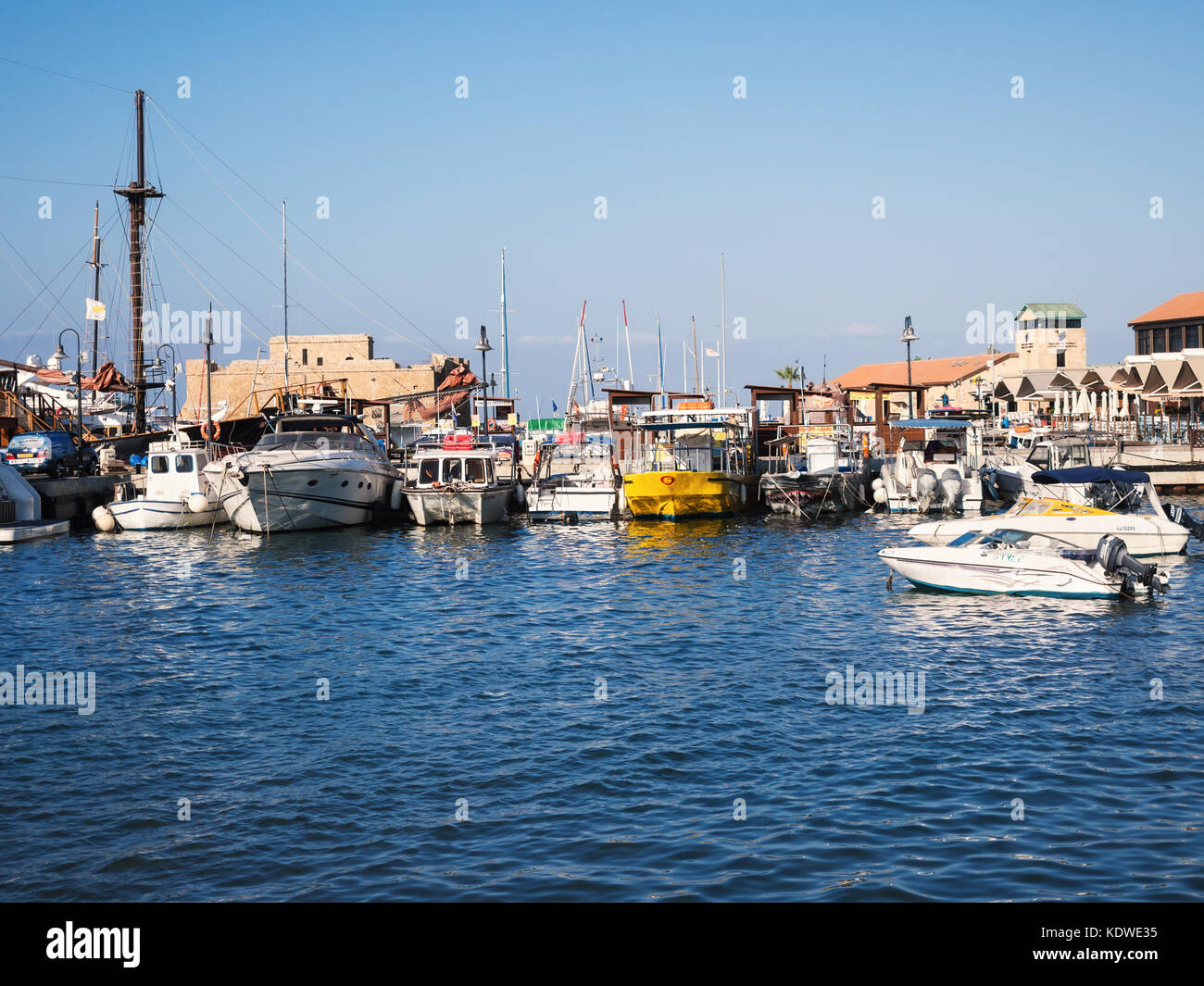 Paphos, Cyprus - July 11, 2016: Yachts and boats moored at a harbour Stock Photo