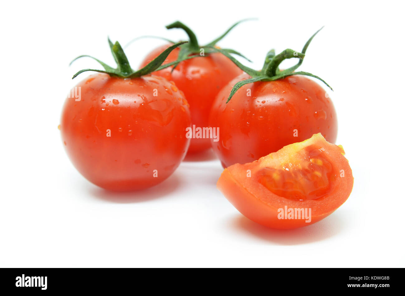 Red cherry tomato isolated on white background Stock Photo - Alamy