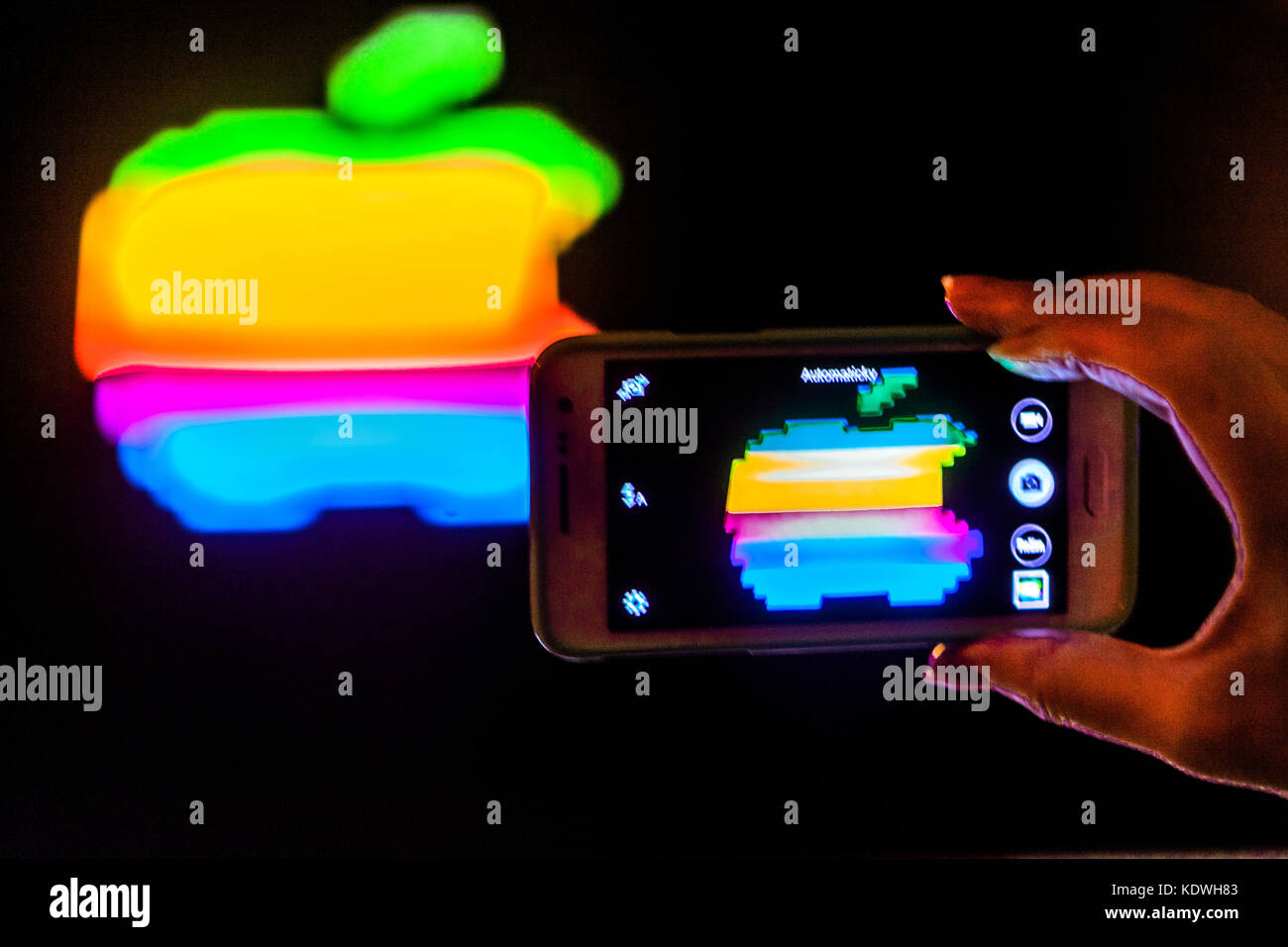 Apple logo iPhone, colorful logo on mobile phone apple logo rainbow Stock Photo