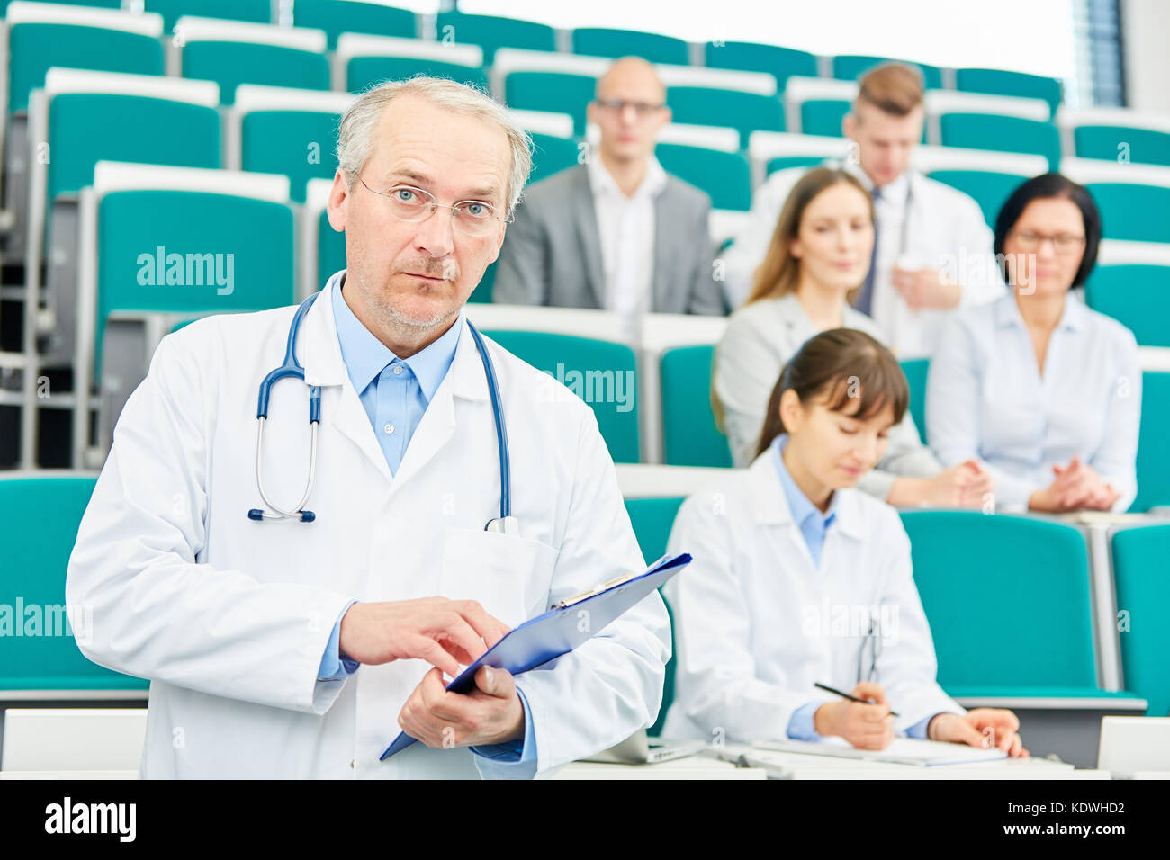 Senior man doctor or physician as medicine lecturer or professor Stock Photo