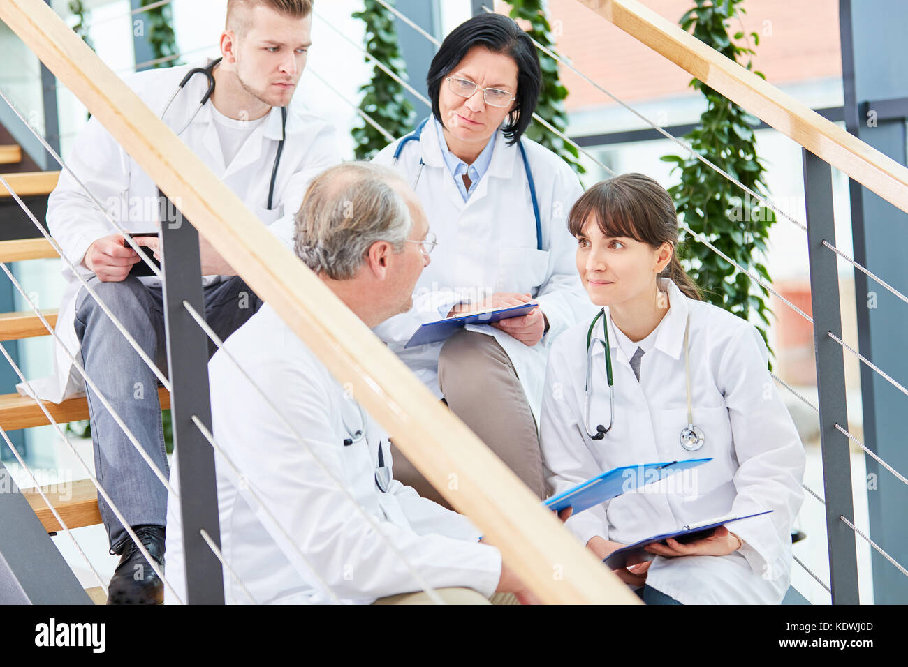Physician with team of doctors and nurse making apprenticeship Stock ...