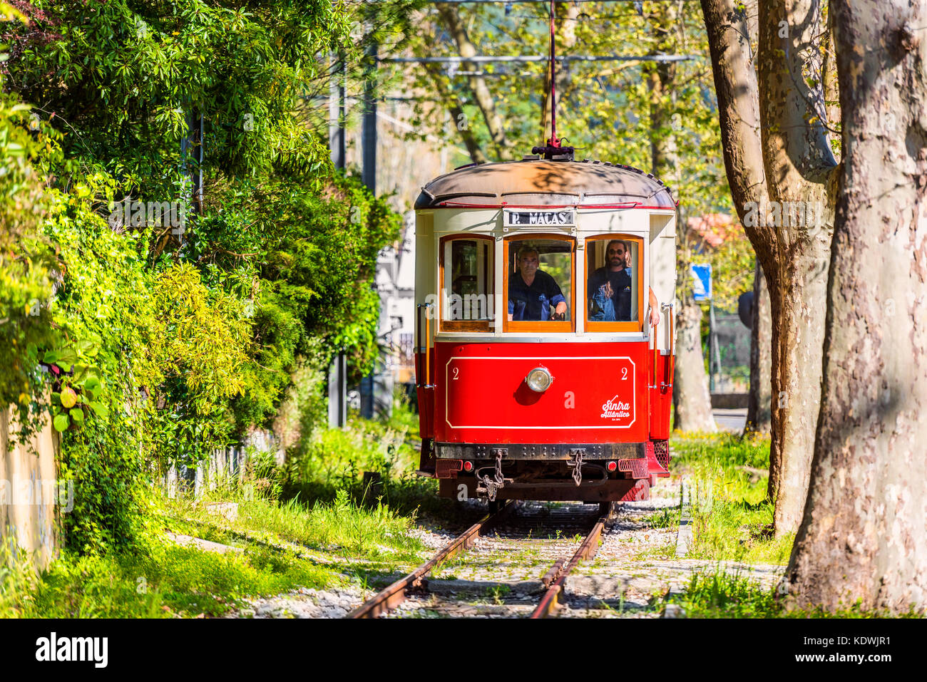 Vintage 1930s tram in the streets of Sintra, Portugal. The tram connects Sintra with the coastal town of Praia das Maçãs, 13 km to the west Stock Photo