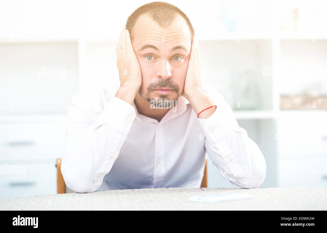 Confused young married man hi-res stock photography and images - Alamy