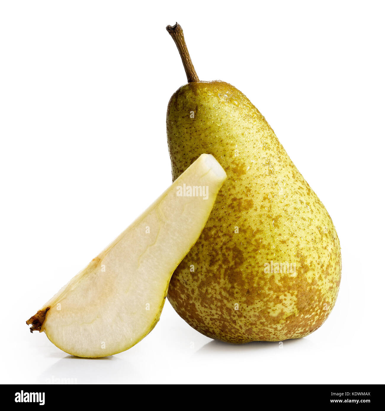 Single abate fetel pear next to a slice of pear isolated on white. Stock Photo