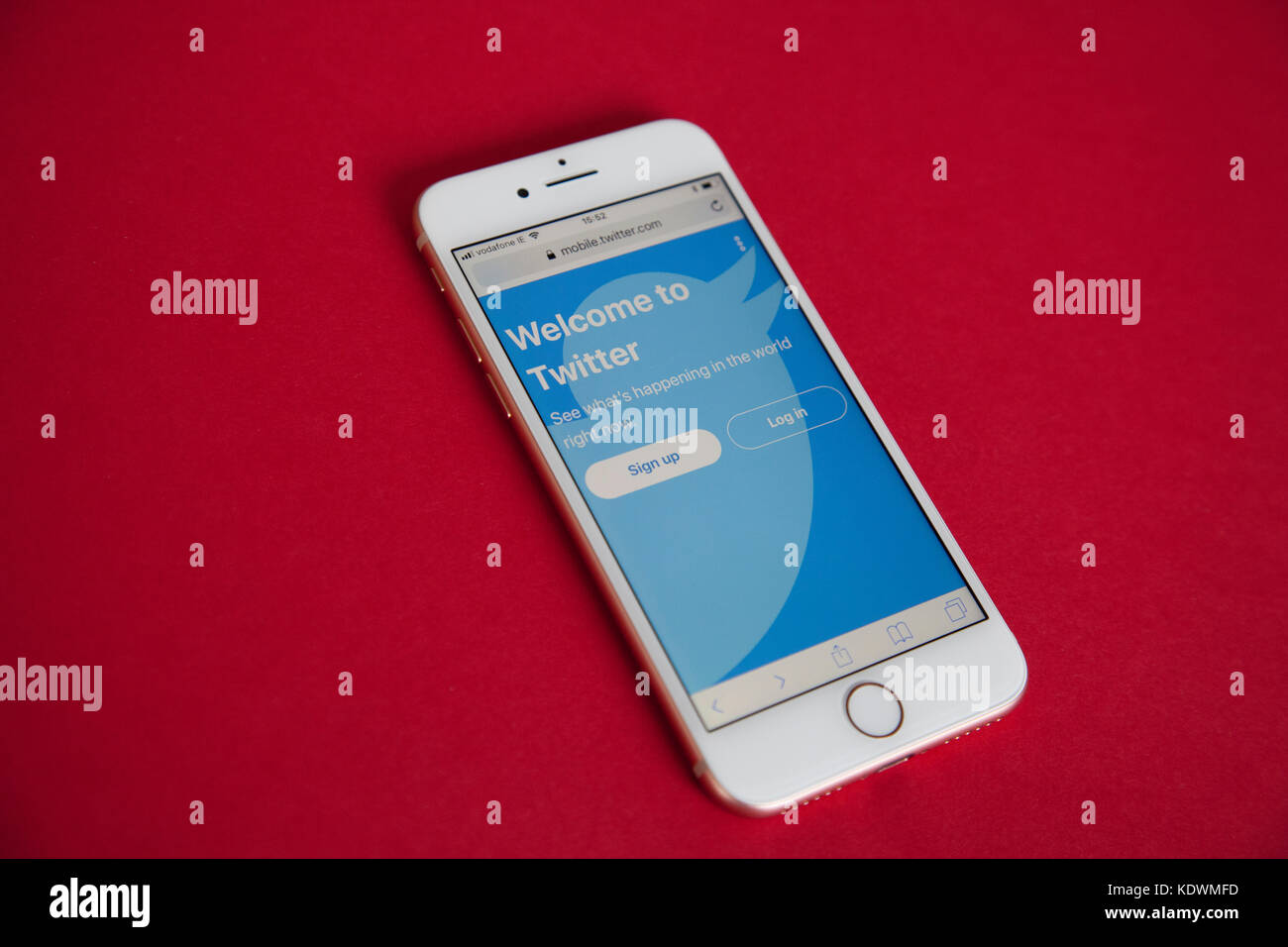 Apple Iphone 8 Model With Twitter Login Screen Against A Red Colour Background Stock Photo Alamy