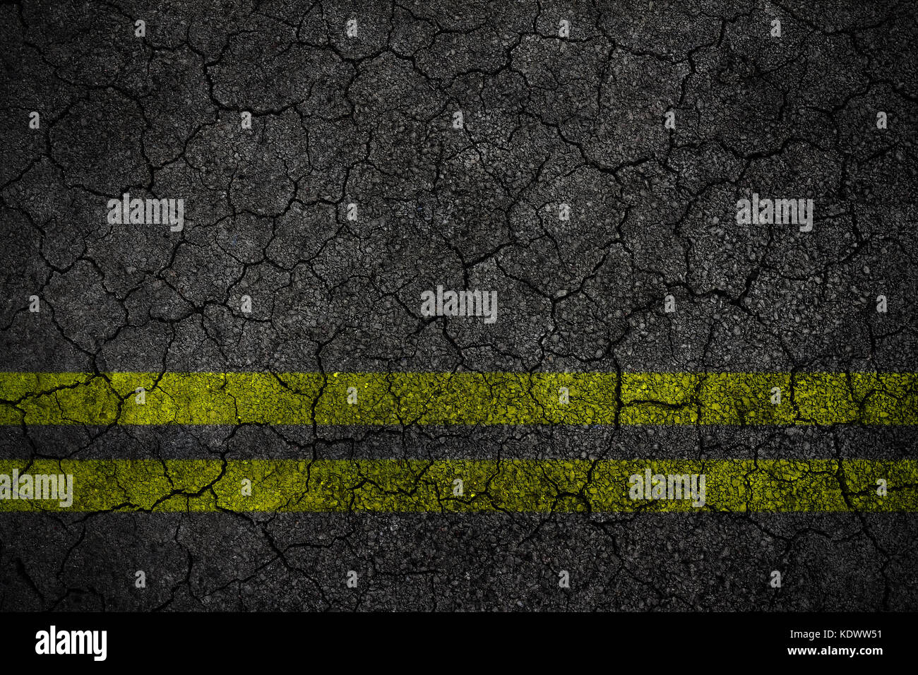 Crack asphalt Road Texture With Yellow Strip Stock Photo - Alamy