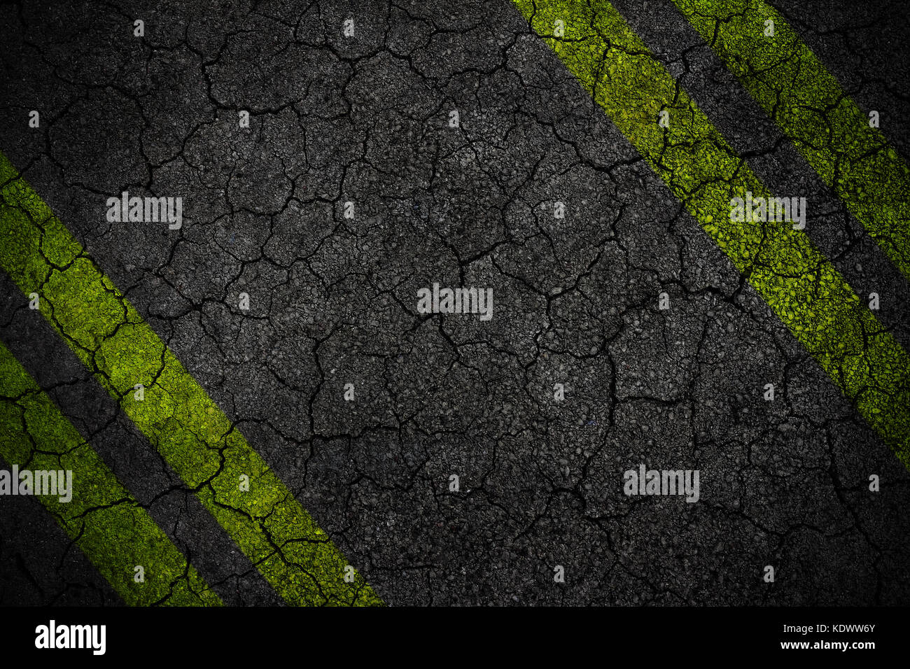 Crack Road texture with four yellow Stock Photo - Alamy